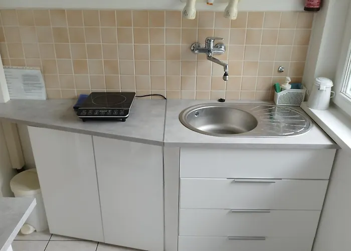 Kameleon Apartmanhaz Ev Toeltessel
